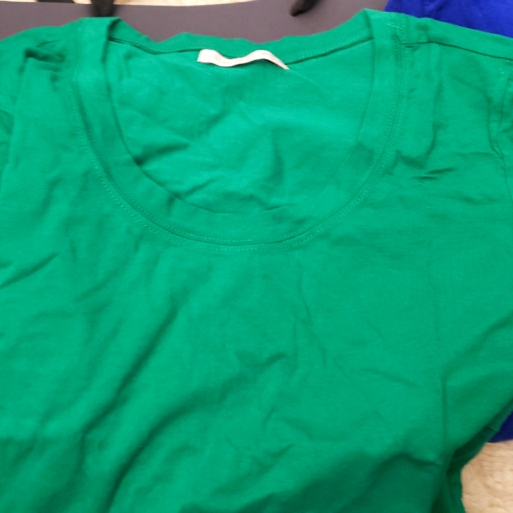2 womens t-shirts, never worn. Price is for both, willing to sell seperate.